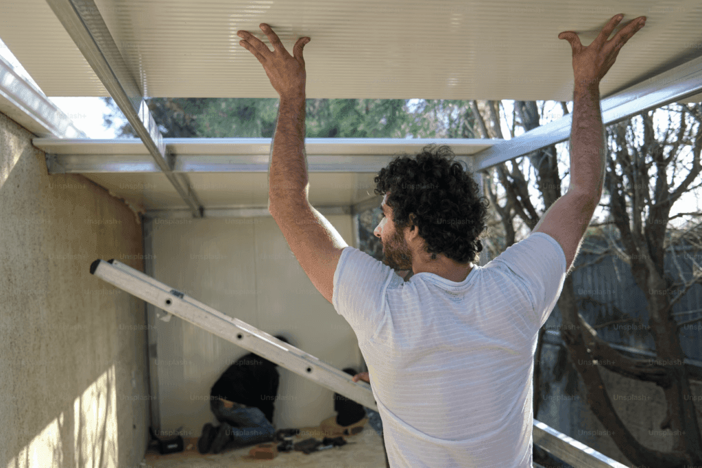 Builder working on a construction project, representing a non-contingent mortgage.